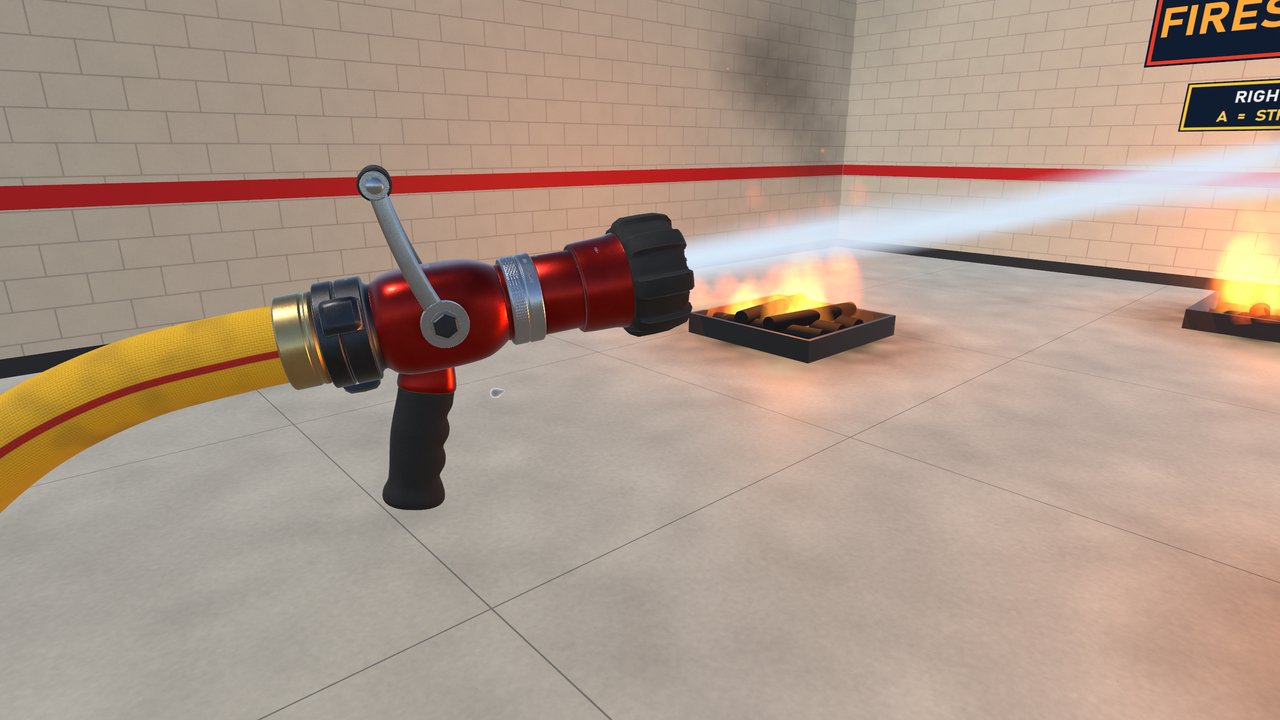 The fire nozzle spraying water at a burning pan